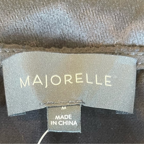 Maura Midi Skirt in Black
MAJORELLE size medium - Picture 5 of 7